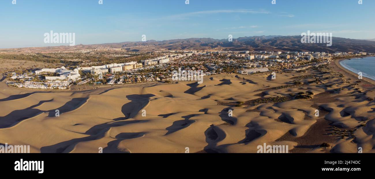Aerial drone landscape of Maspalomas golden sand dunes at sunrise, Gran  Canaria, Canary Islands, Spain Stock Photo - Alamy