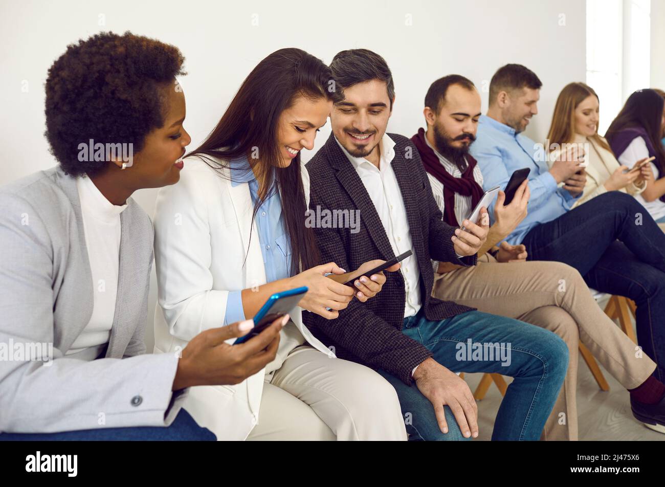 Row of mobile phones hi-res stock photography and images - Alamy