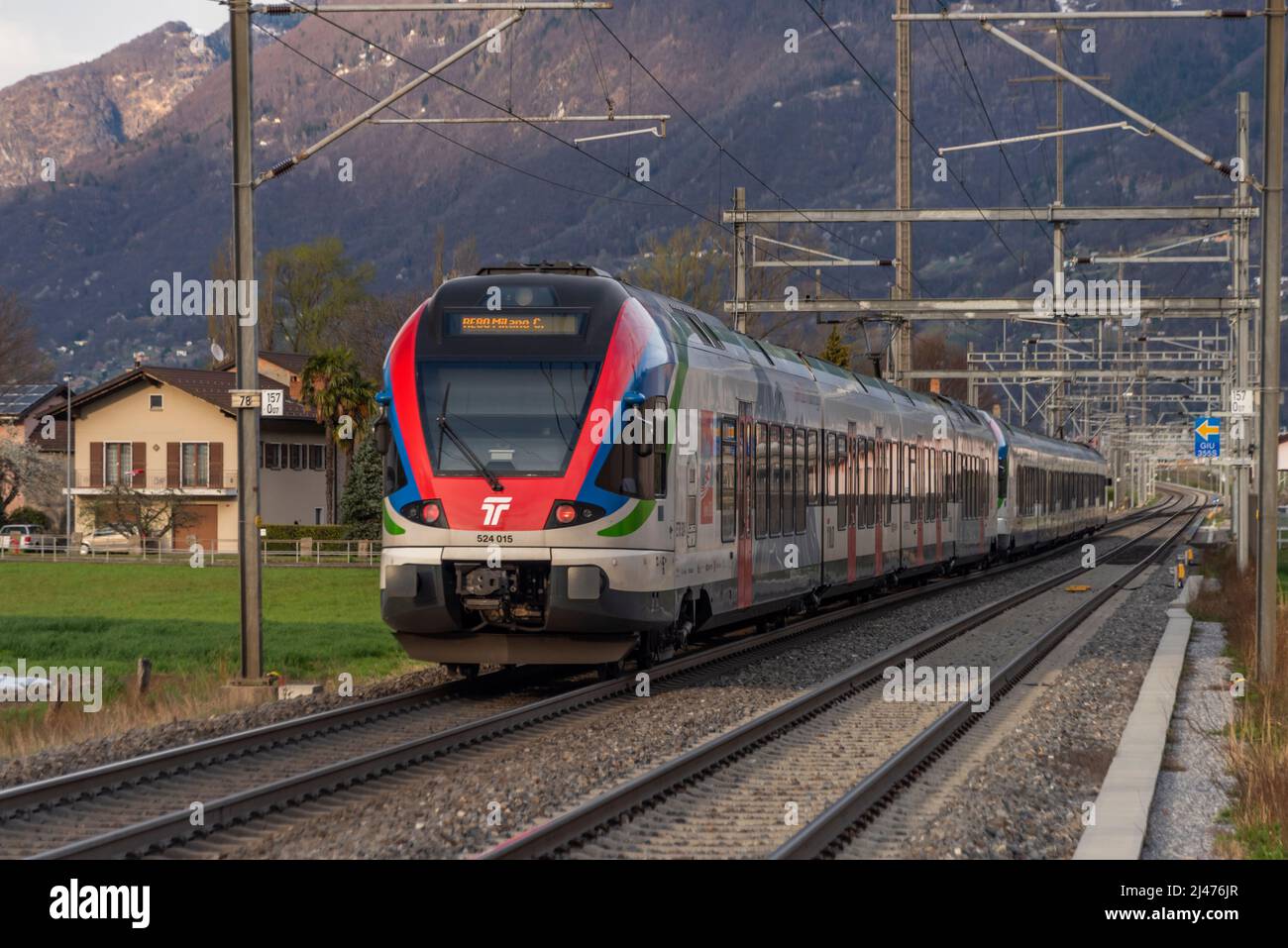 Red high speed train near Bellinzona old town in south Switzerland Stock Photo