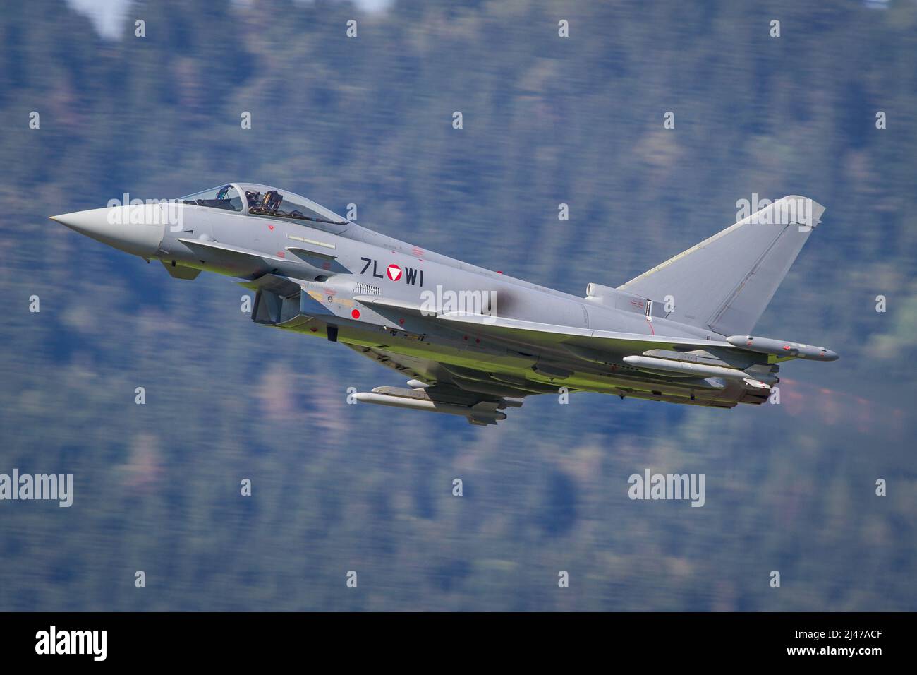 Austrian Air Force Bundesheer Eurofighter jet plane departing with full afterburner to an interception mission Stock Photo