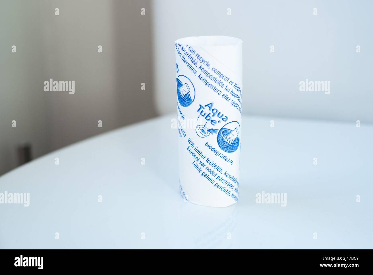 Aqua tube or Aquatube is toilet paper roll which can be flushed down the toilet. Biodegradable, recyclable and compostable toilet paper tube. Stock Photo