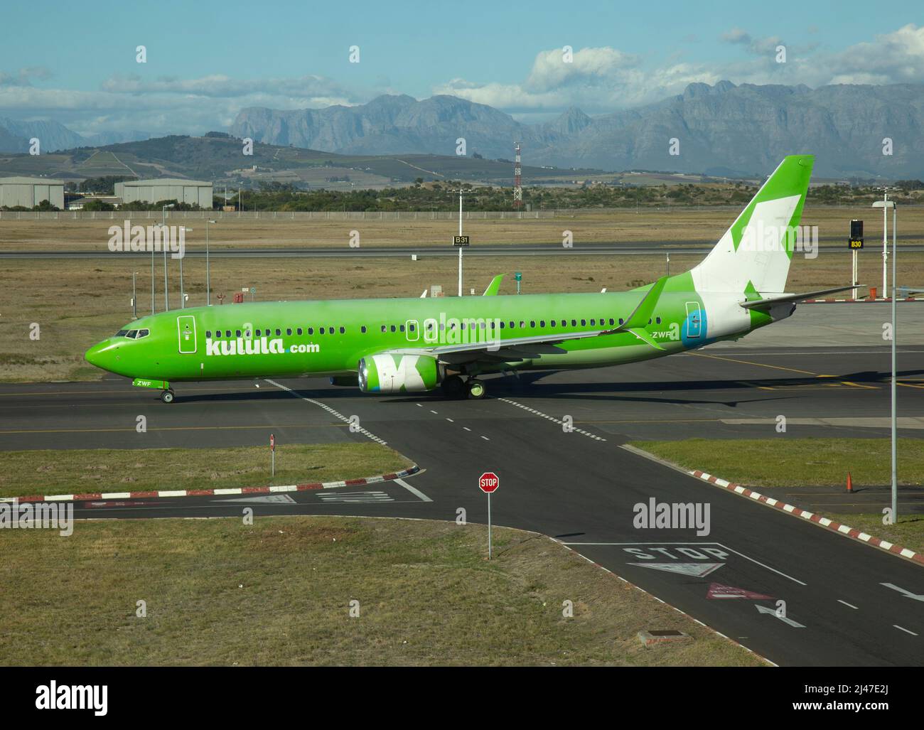 A Kulula Airlines Boeing 737-800 airliner, ZS-ZWF, at Cape Town International Airport, South Africa. Stock Photo