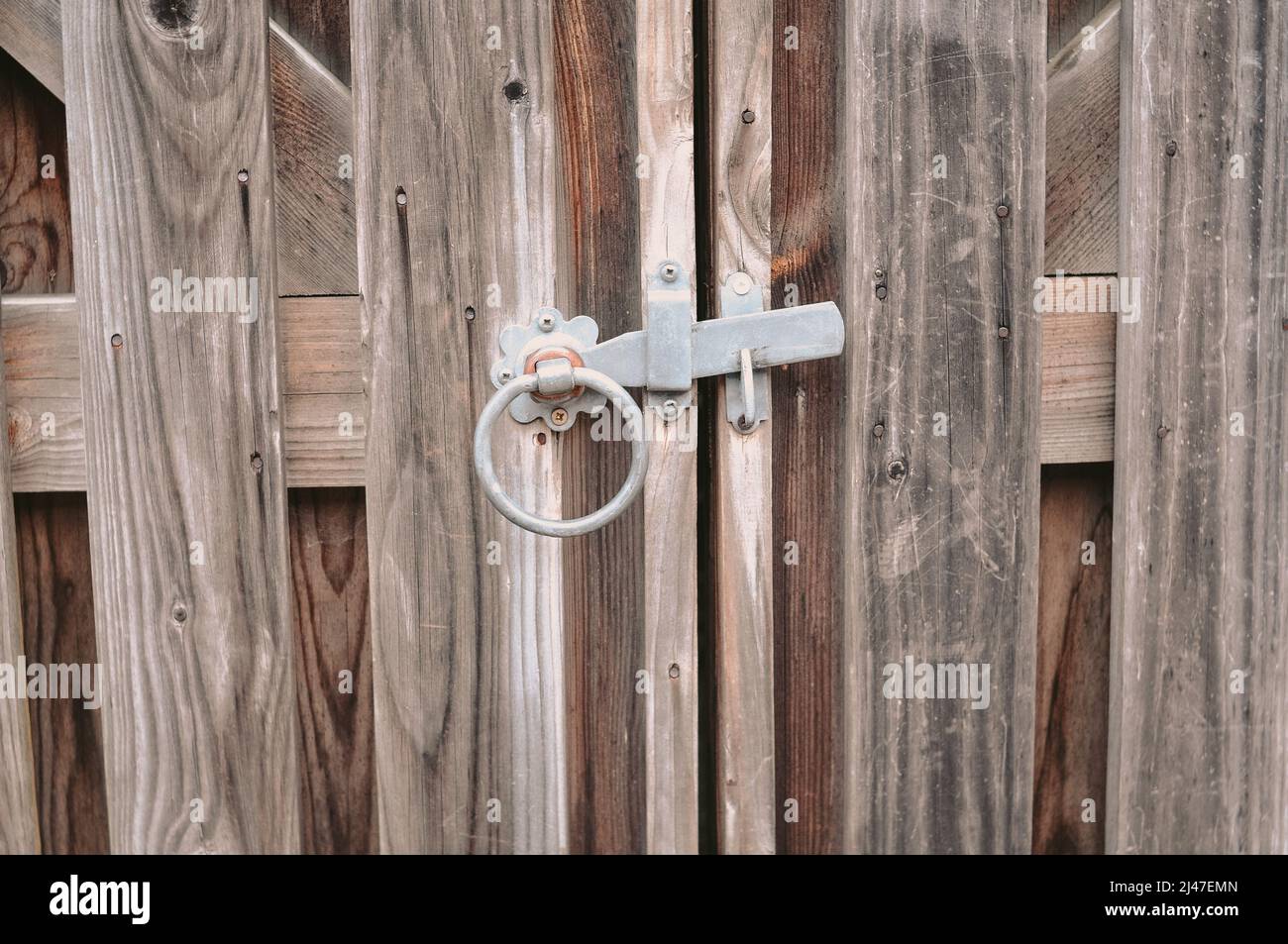 Lock on the old vintage wooden door copy space Stock Photo