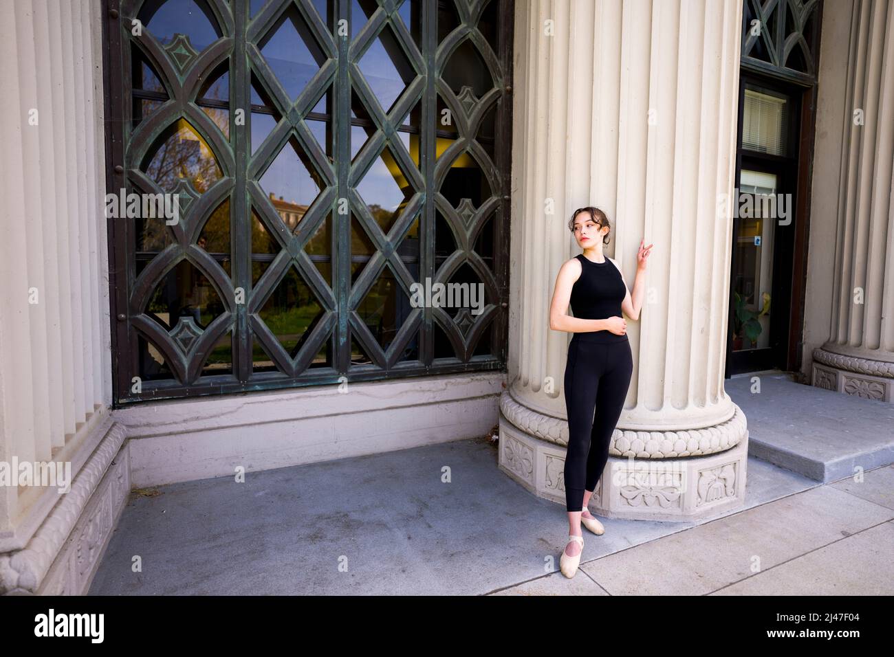 Teenage Female Dancer Stretching on Berkeley Psychology Building Stairs Stock Photo