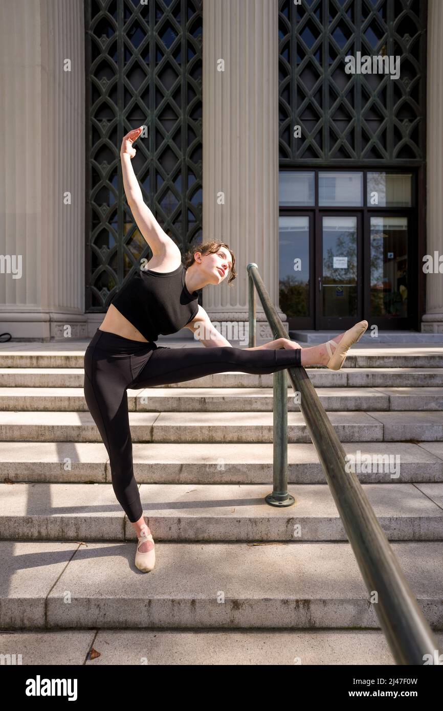 Teenage Female Dancer Stretching on Berkeley Psychology Building Stairs Stock Photo