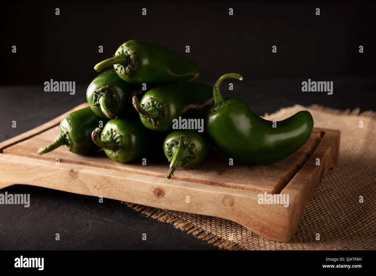 Serrano Chile or Green Chile. (Capsicum annum). Very popular variety of hot chili in Mexican cuisine, it is commonly consumed fresh in a wide variety Stock Photo