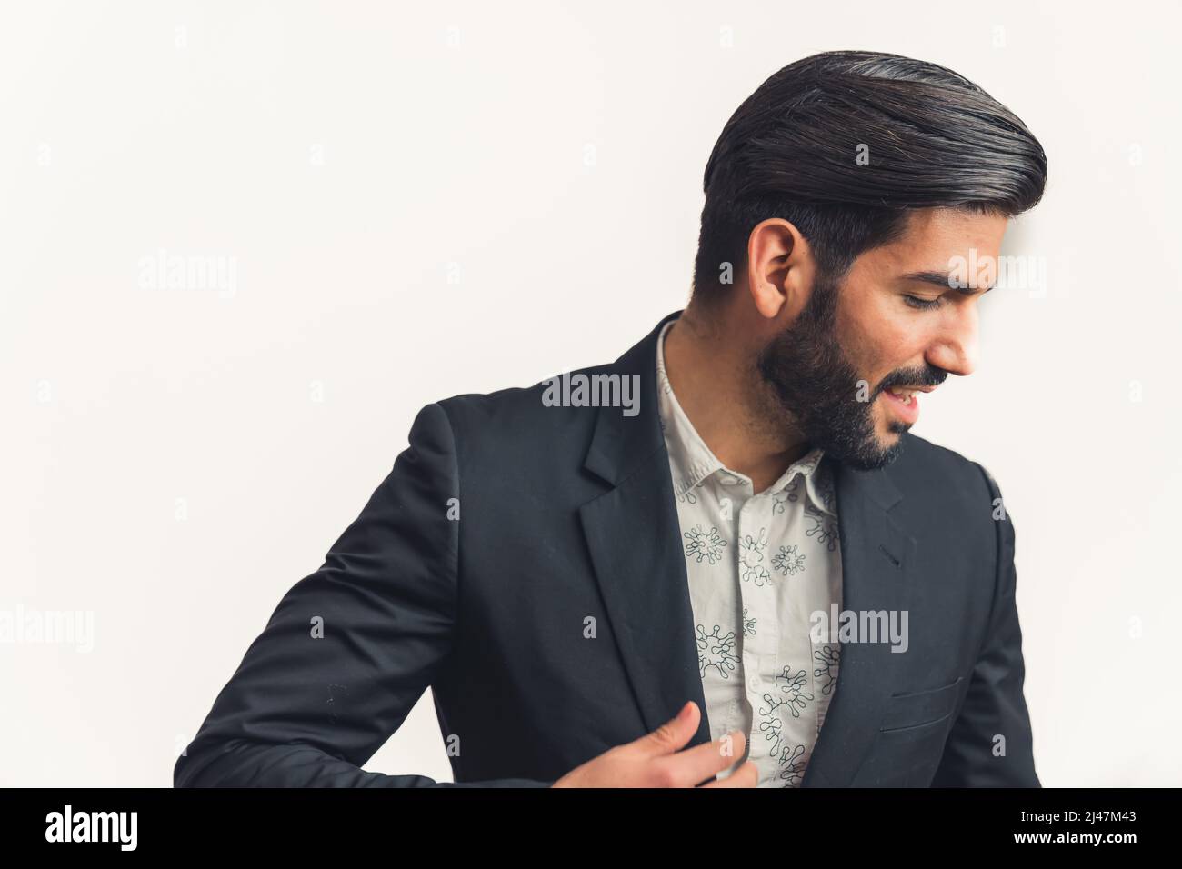 handsome bearded man looking down copy space isolated medium closeup business concept. High quality photo Stock Photo
