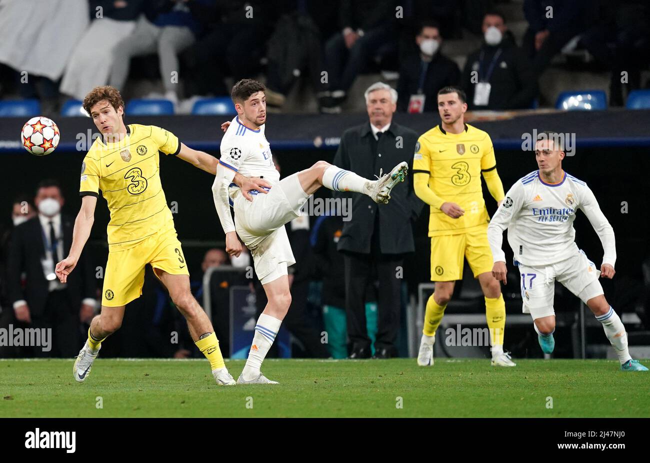 Chelsea's Marcos Alonso (left) and Real Madrid's Federico Valverde battle for the ball during the UEFA Champions League quarter final, second leg match at Santiago Bernabeu Stadium, Madrid. Picture date: Tuesday April 12, 2022. Stock Photo