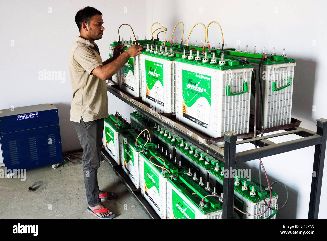 Batteries store electricity through solar panels on the roof of the Vishwa Jyoti Gurukul