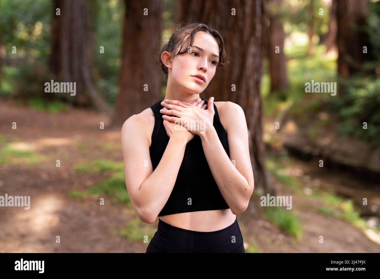 Teenage Dancer Acting Out Lost Love in Redwood Grove on the UC Berkeley Campus Stock Photo