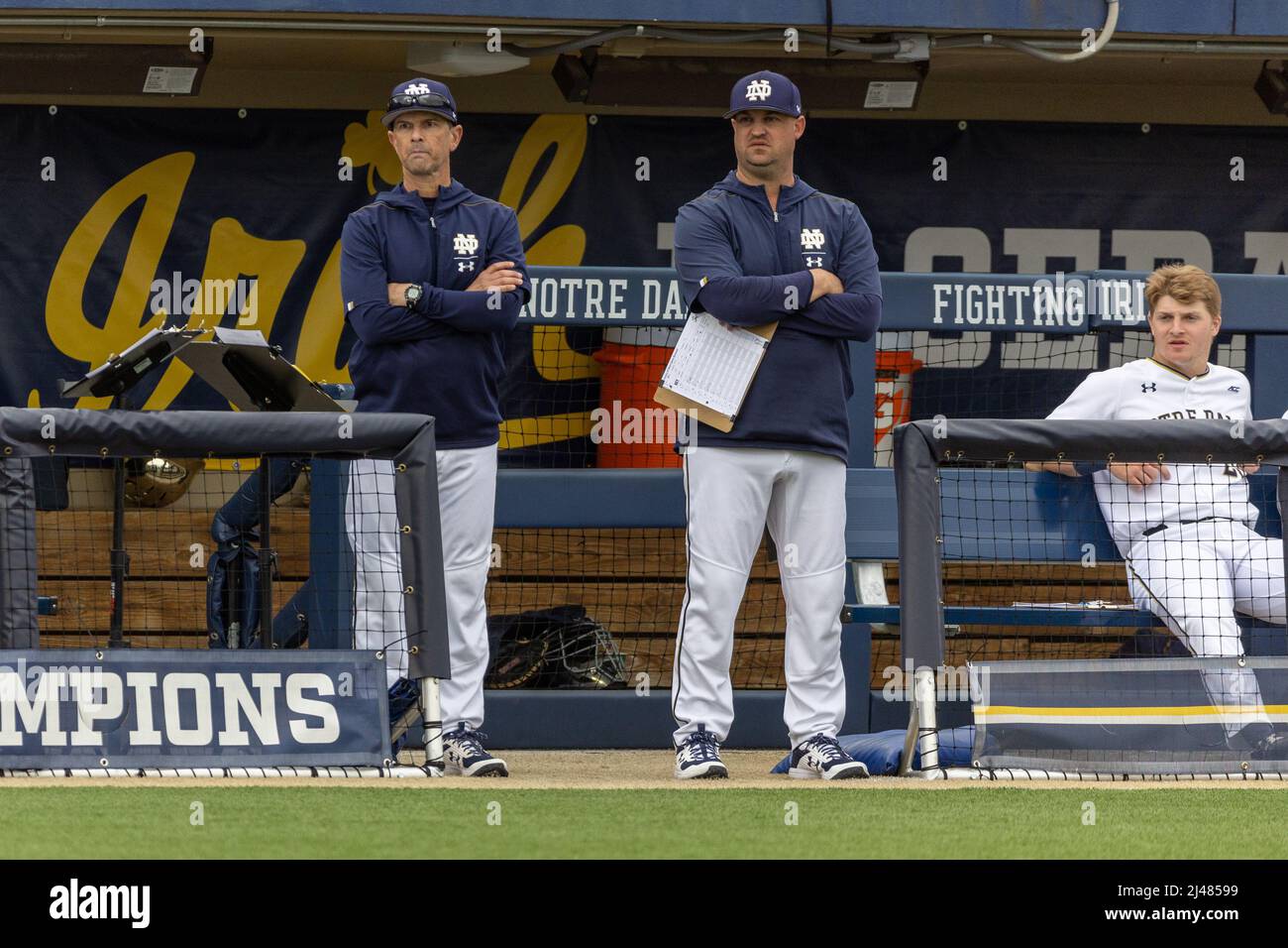 April 12, 2022: Notre Dame head coach Link Jarrett watches on from the  dugout during NCAA Baseball game action between the Michigan Wolverines and  the Notre Dame Fighting Irish at Frank Eck