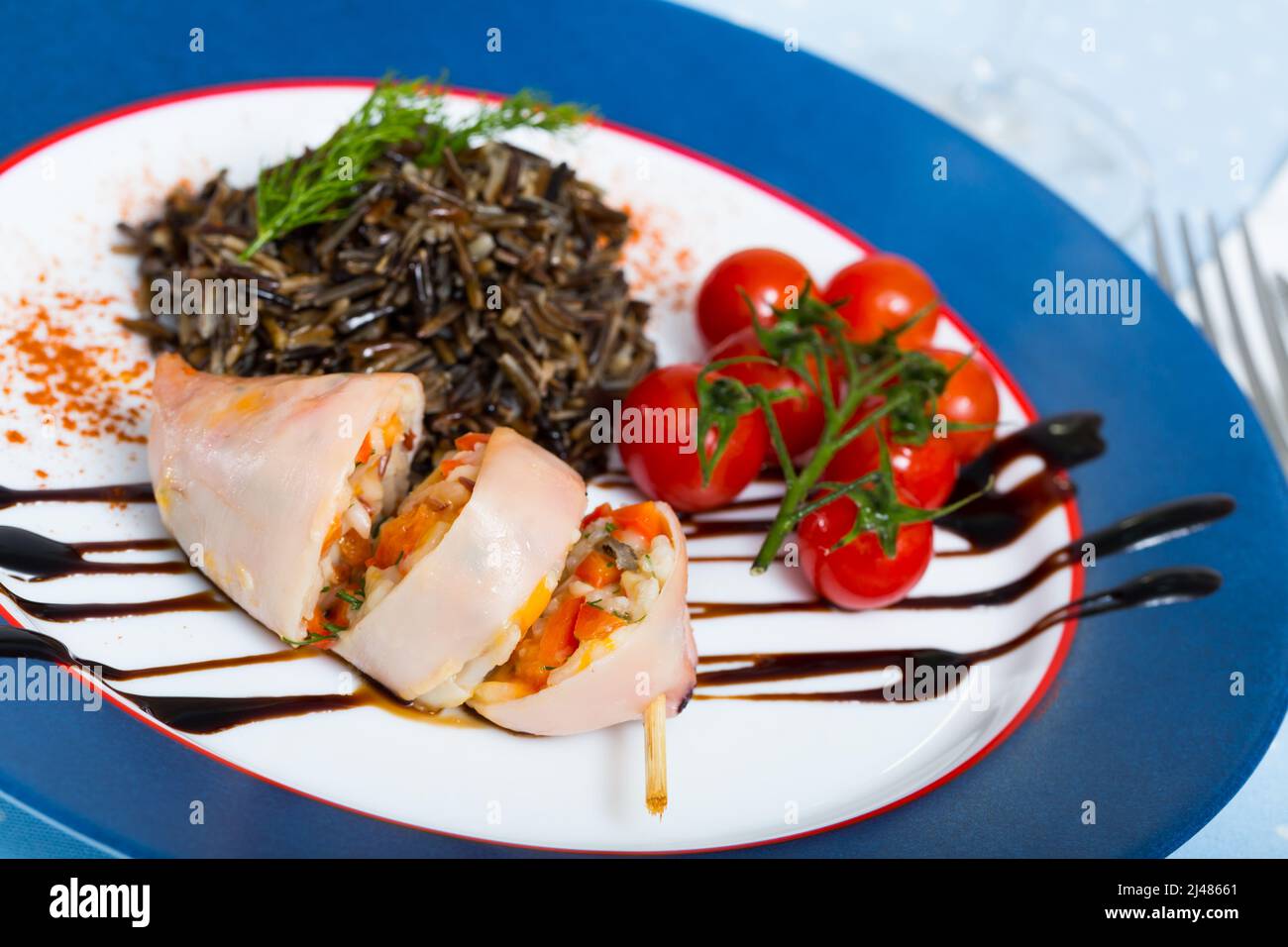 Stuffed squid with wild rice Stock Photo - Alamy
