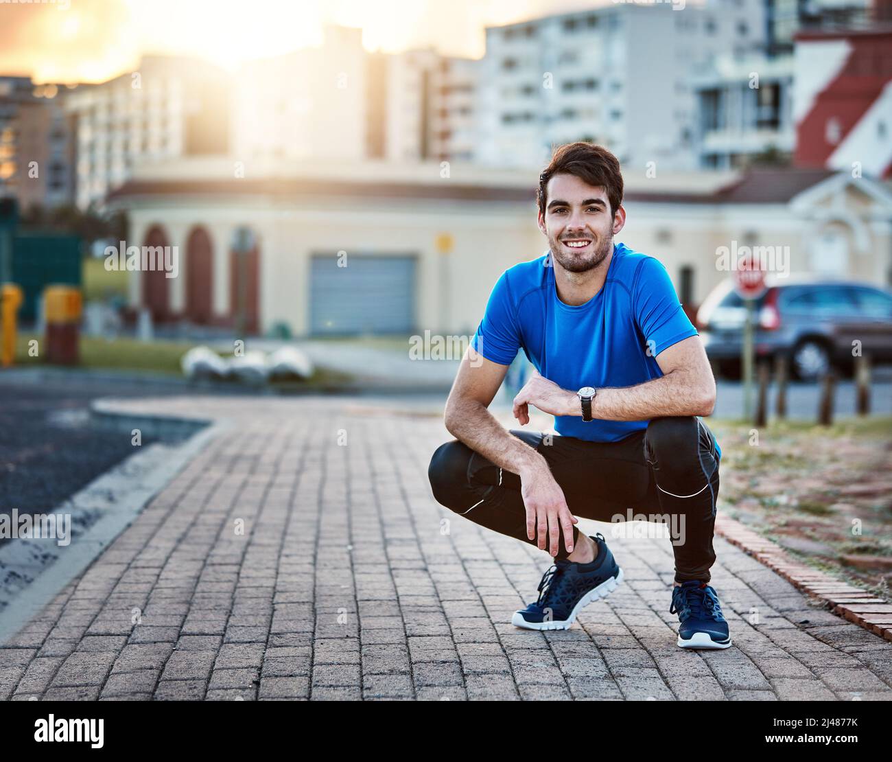 https://c8.alamy.com/comp/2J4877K/im-more-of-a-pavement-pounder-than-a-gym-rat-shot-of-a-handsome-young-man-exercising-outdoors-2J4877K.jpg