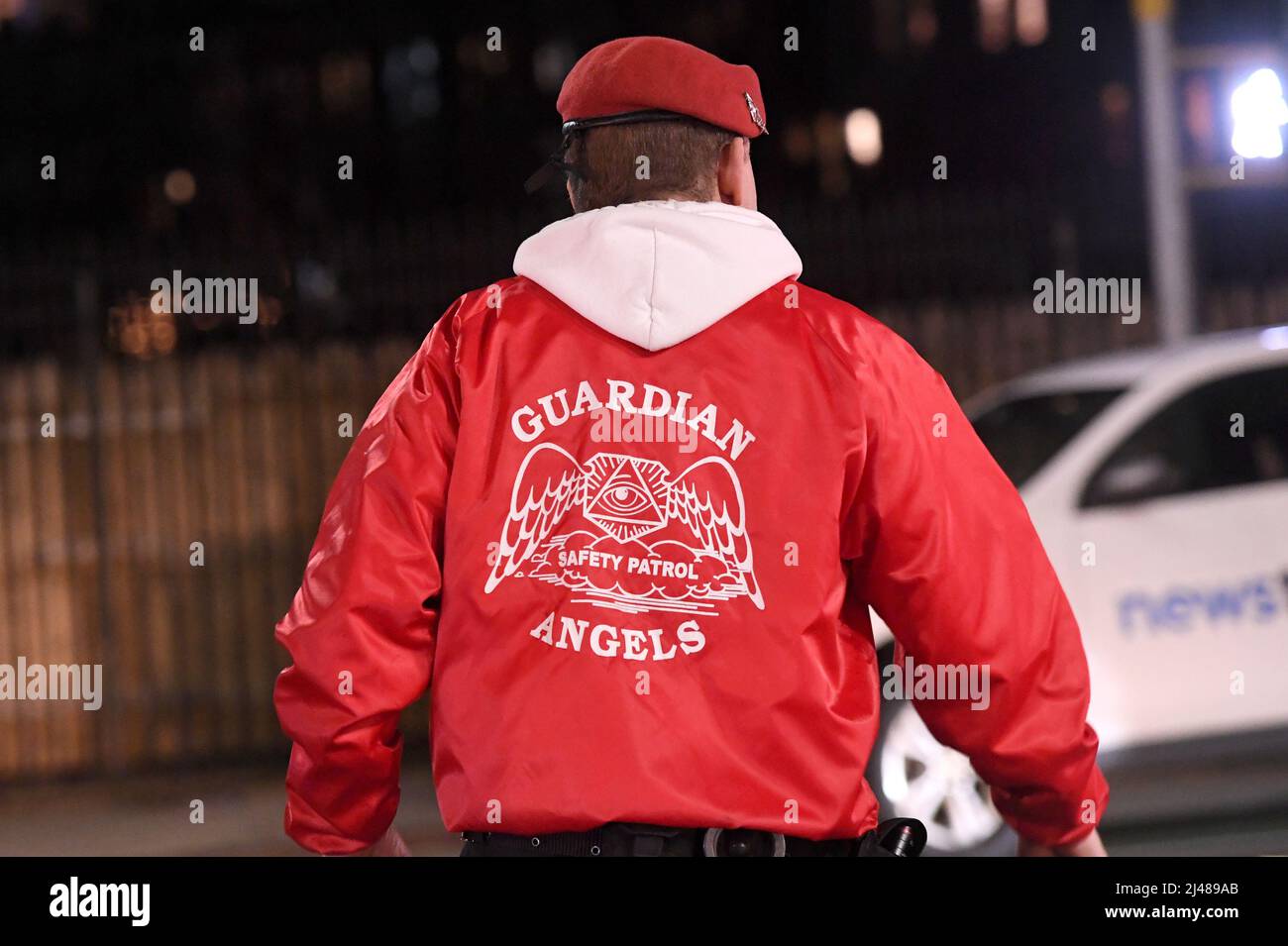 New York, USA. 12th Apr, 2022. A member of the Guardian Angels arrive at the scene of a shooting at the 36th Street subway station in the Brooklyn borough of New York City, April 12, 2022. Police reported that 10 people were shot, 29 people were injured and several undetonated devices were found after a gunman opened fire inside a Brooklyn subway station Tuesday morning, with the suspect still at large. (Photo by Anthony Behar/Sipa USA) Credit: Sipa USA/Alamy Live News Stock Photo