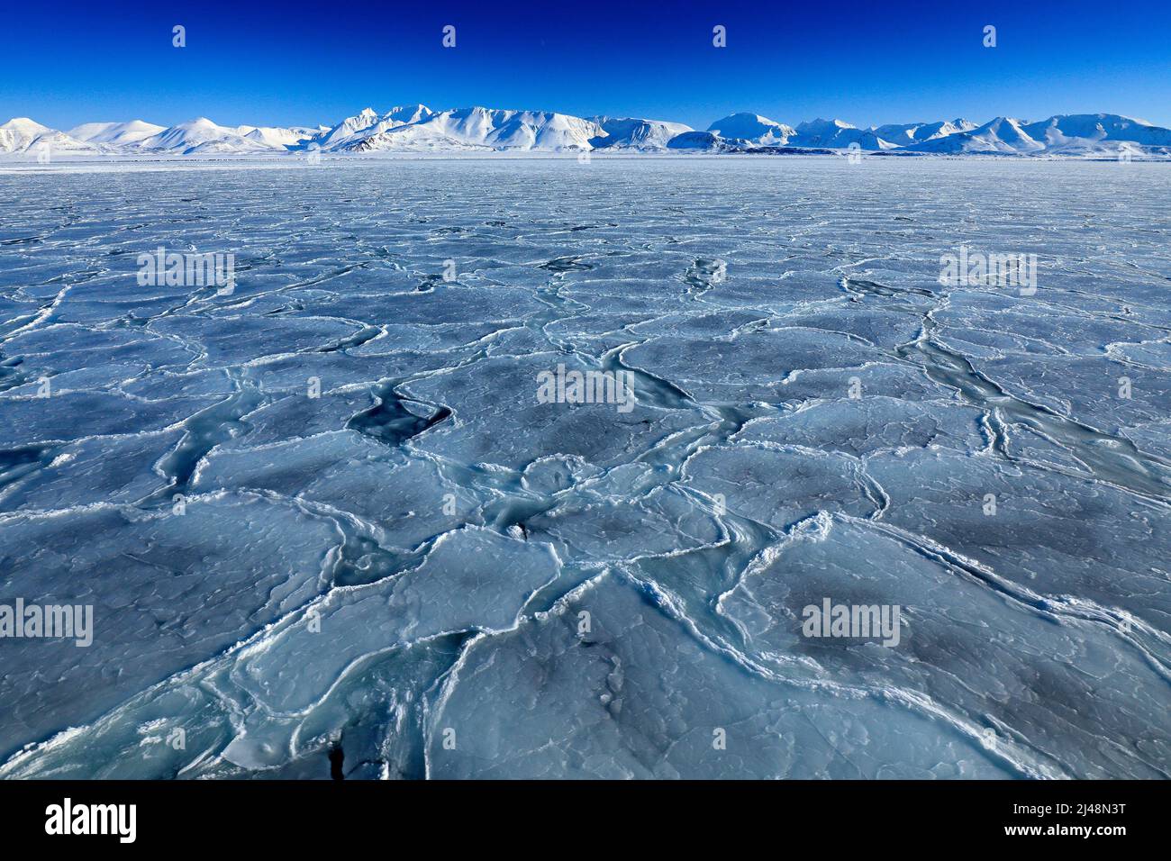 Land of ice. Winter Arctic. White snowy mountain, blue glacier Svalbard ...