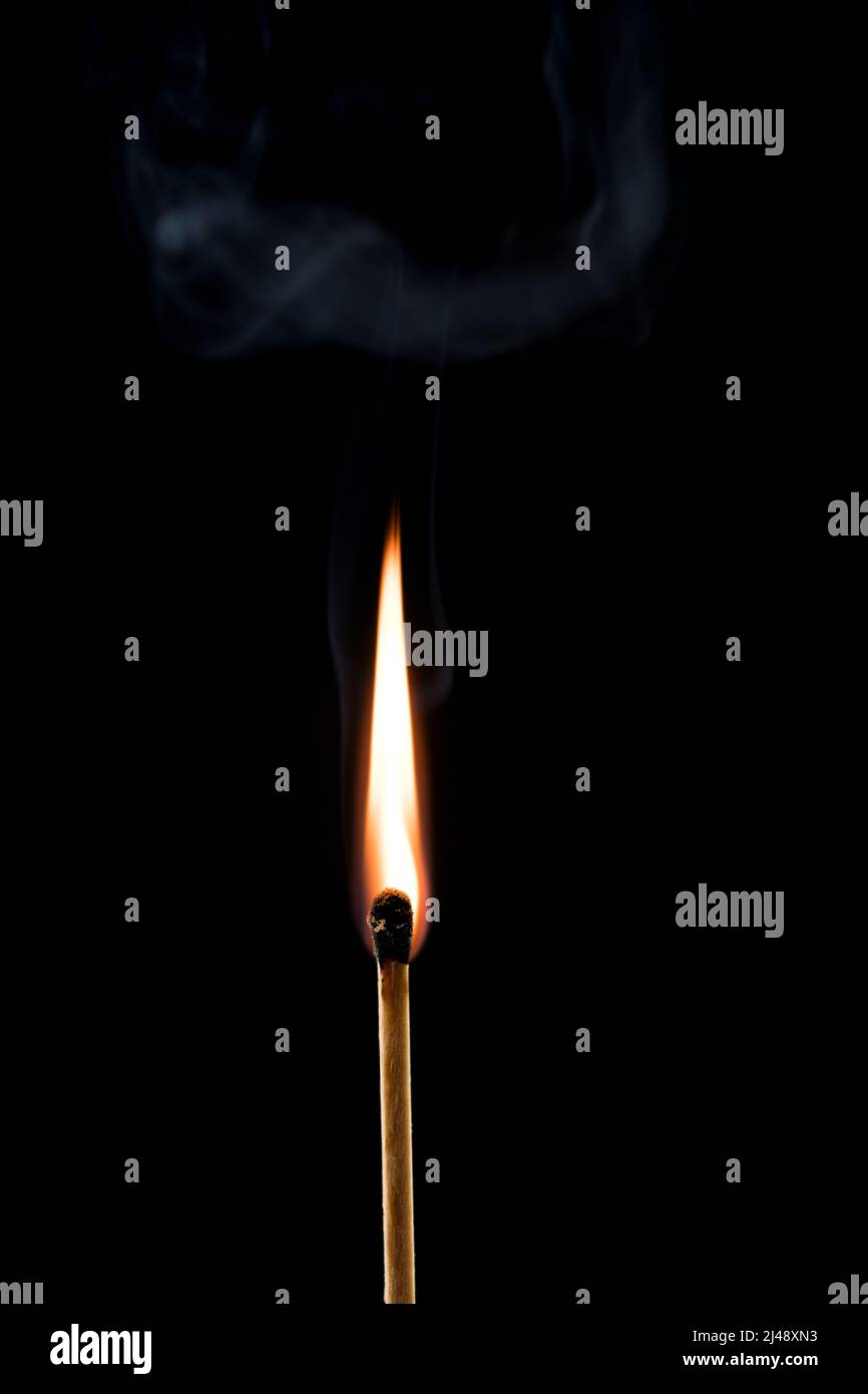 Close up of burning match matchstick shortly after lighting with still ...