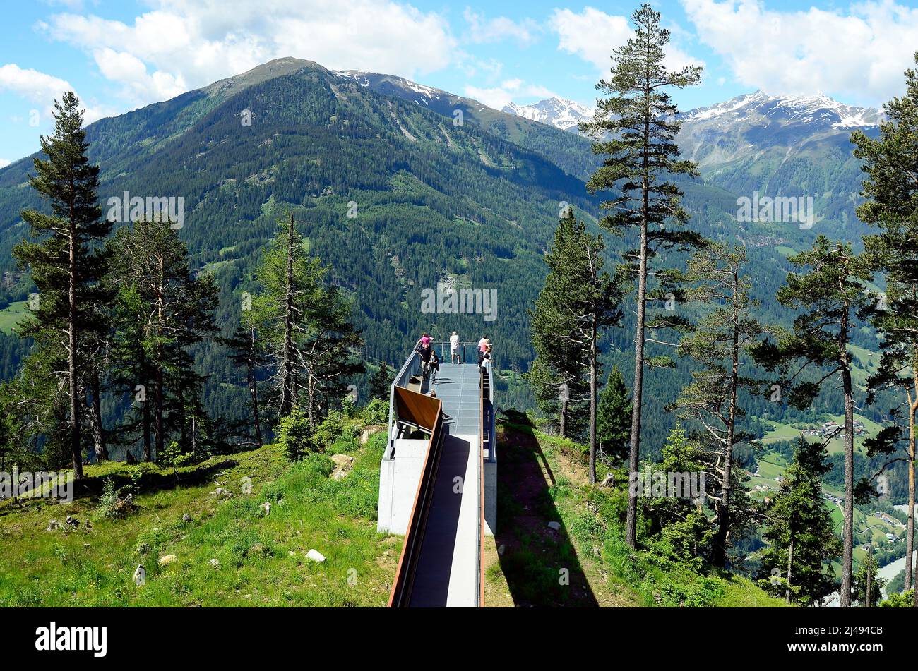 Kaunergrat, Tyrol - June 22, 2016: Unidenified people on viewing point named Gacher Blick with Austrian Alps and Inn-valley Stock Photo