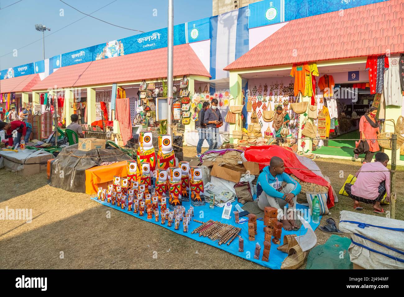 Handicraft fair with view of stalls displaying handmade craft items for