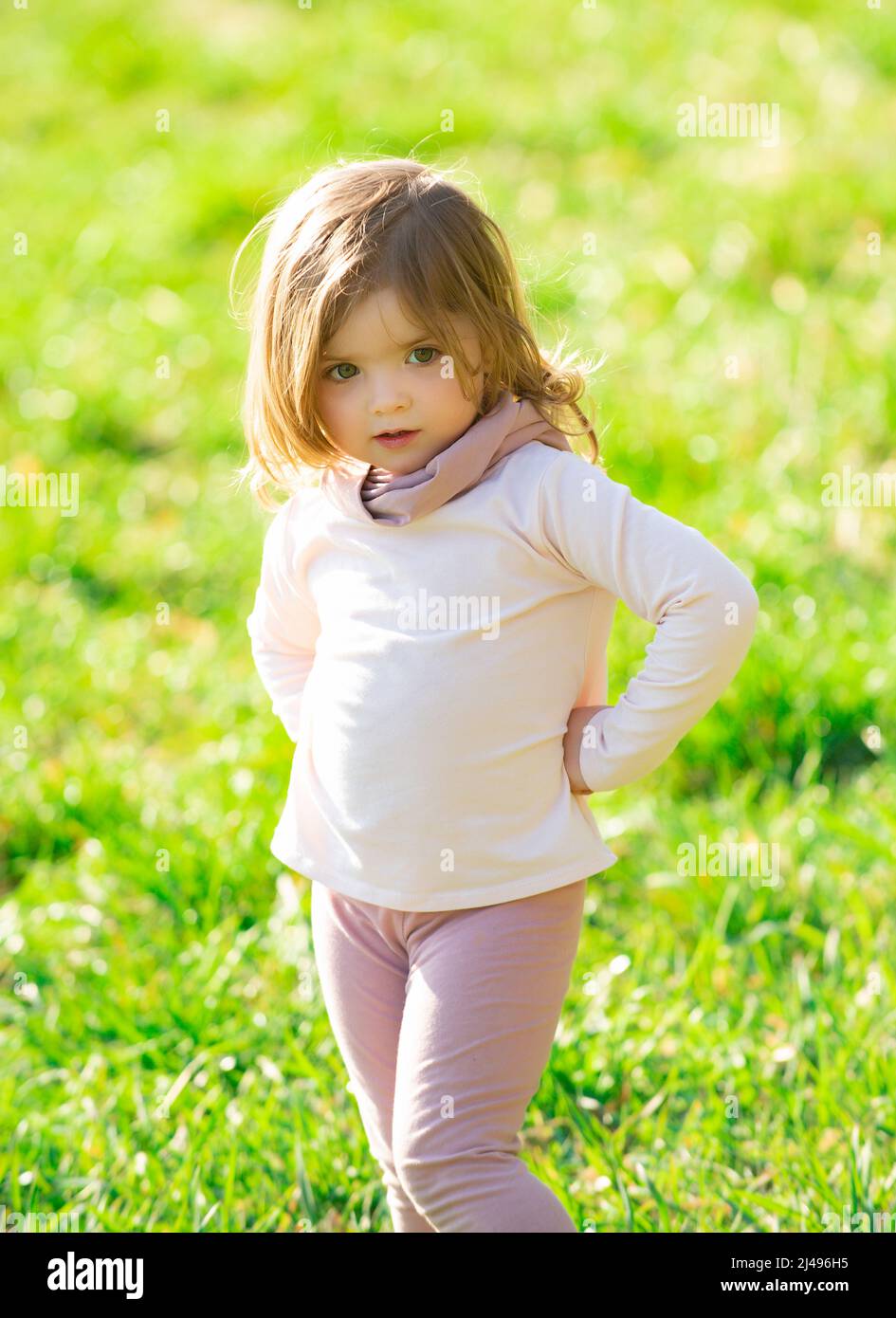 Baby child girl enjoy the summer on the nature in the park outdoor