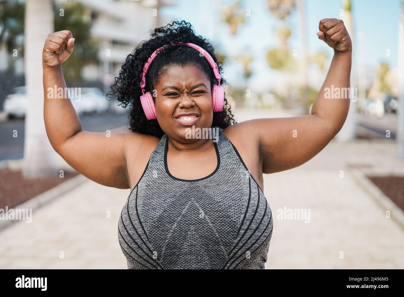 Happy Curvy African Woman Doing Workout Routine Outdoor Focus On Face