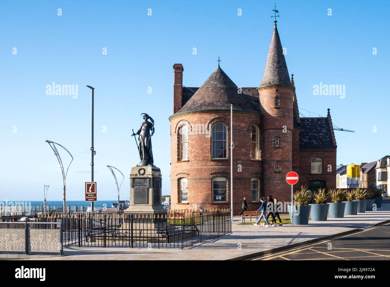 War Memorial in Portrush, Co. Antrim Northern Ireland in front of Portrush Town Hall Stock Photo