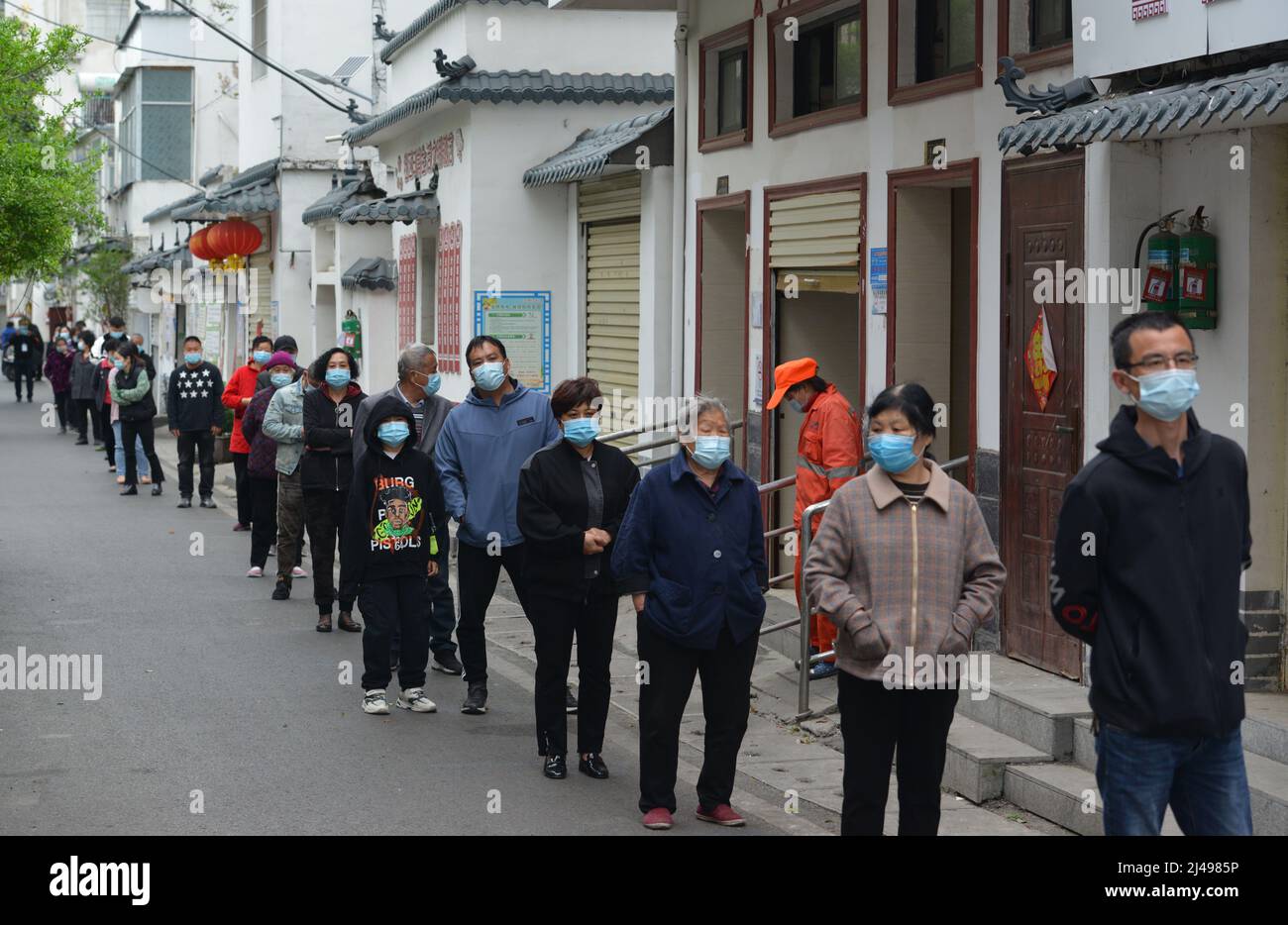 Queue Inchina Fuyang, China. 13th Apr, 2022. Residents wait in long queues to be ...