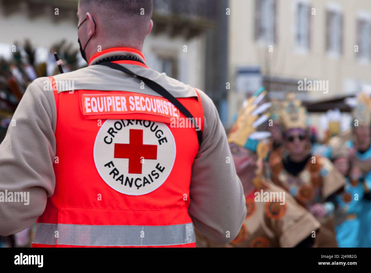 Landerneau, France - April 03 2022: Rescue worker from the French red cross patrolling during the carnival. Stock Photo
