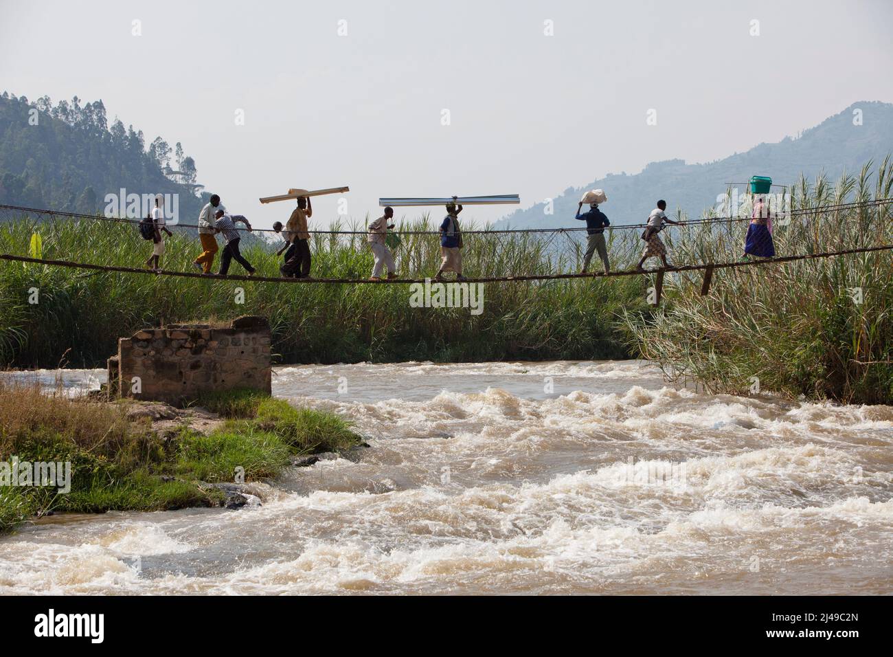 Bridge over Murngwa River that seperates the west from the south province at Busengo sector, Gakenke district.  Photograph by Mike Goldwater Stock Photo