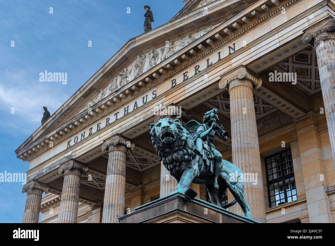 Bronze lion statue in front of the Berlin Concert Hall located in Gendarmenmarkt square, Germany. Stock Photo
