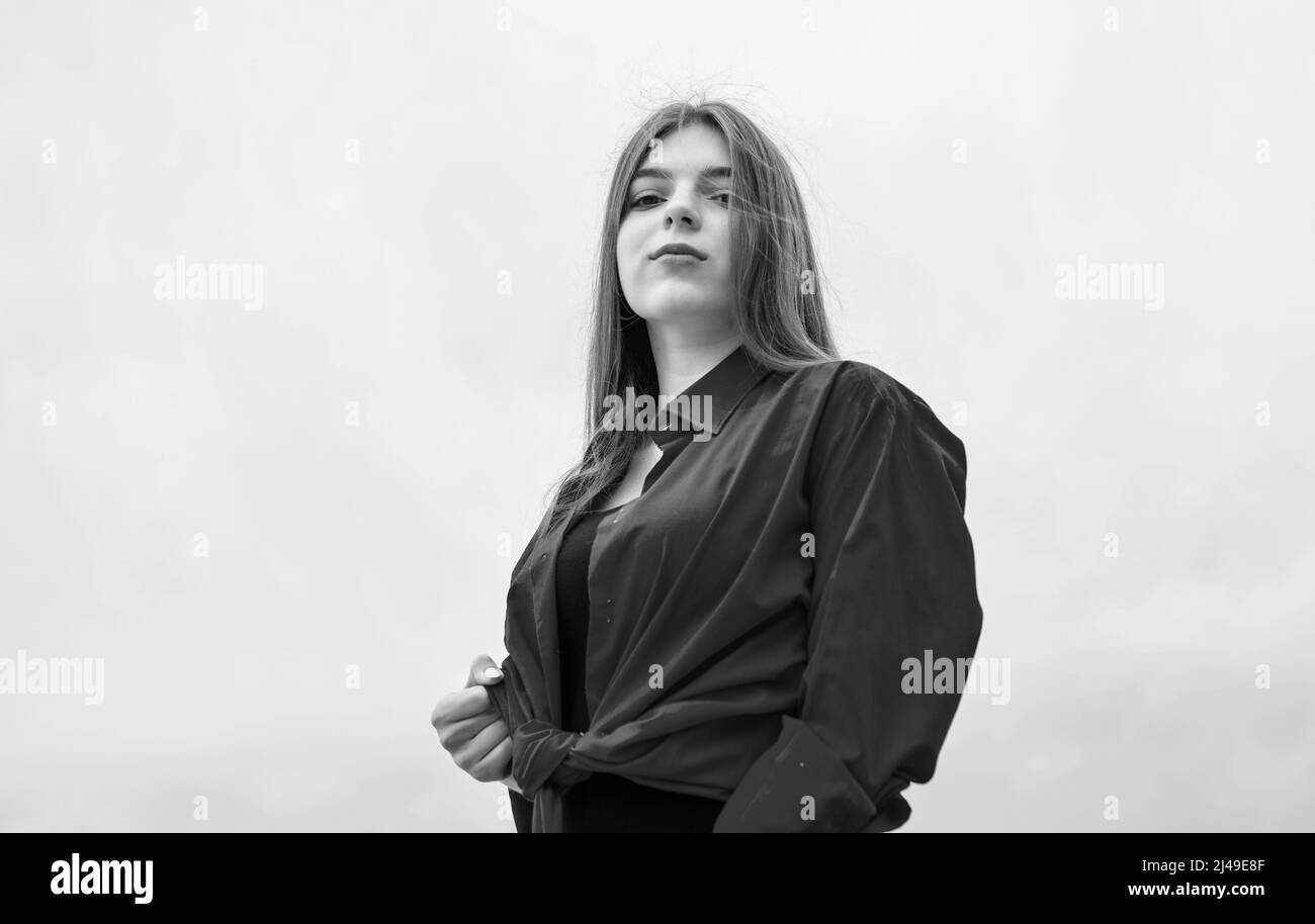 happy teen girl wear red shirt outdoor on sky background, fashion Stock