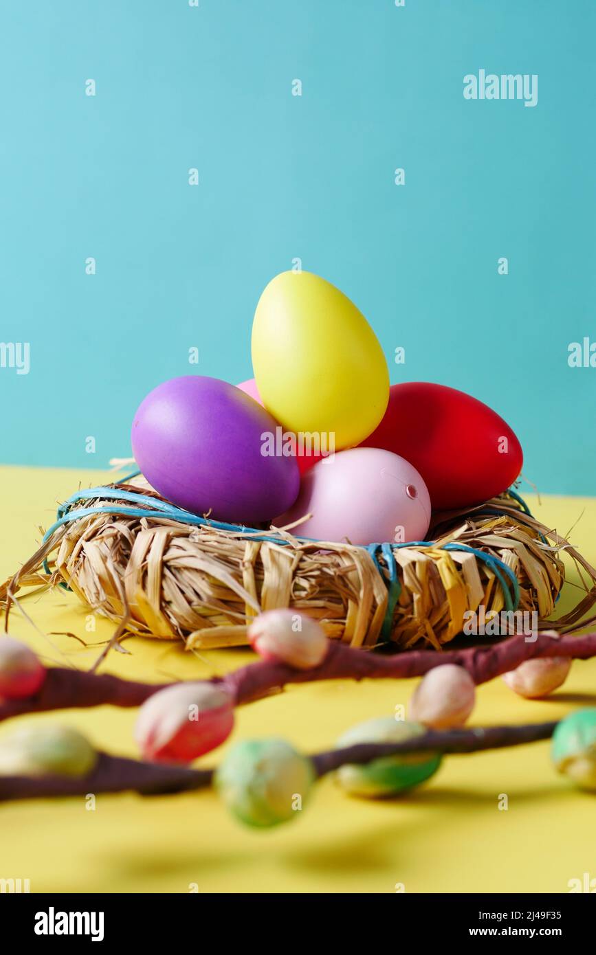 easter concept with multi color egg on color background. Stock Photo