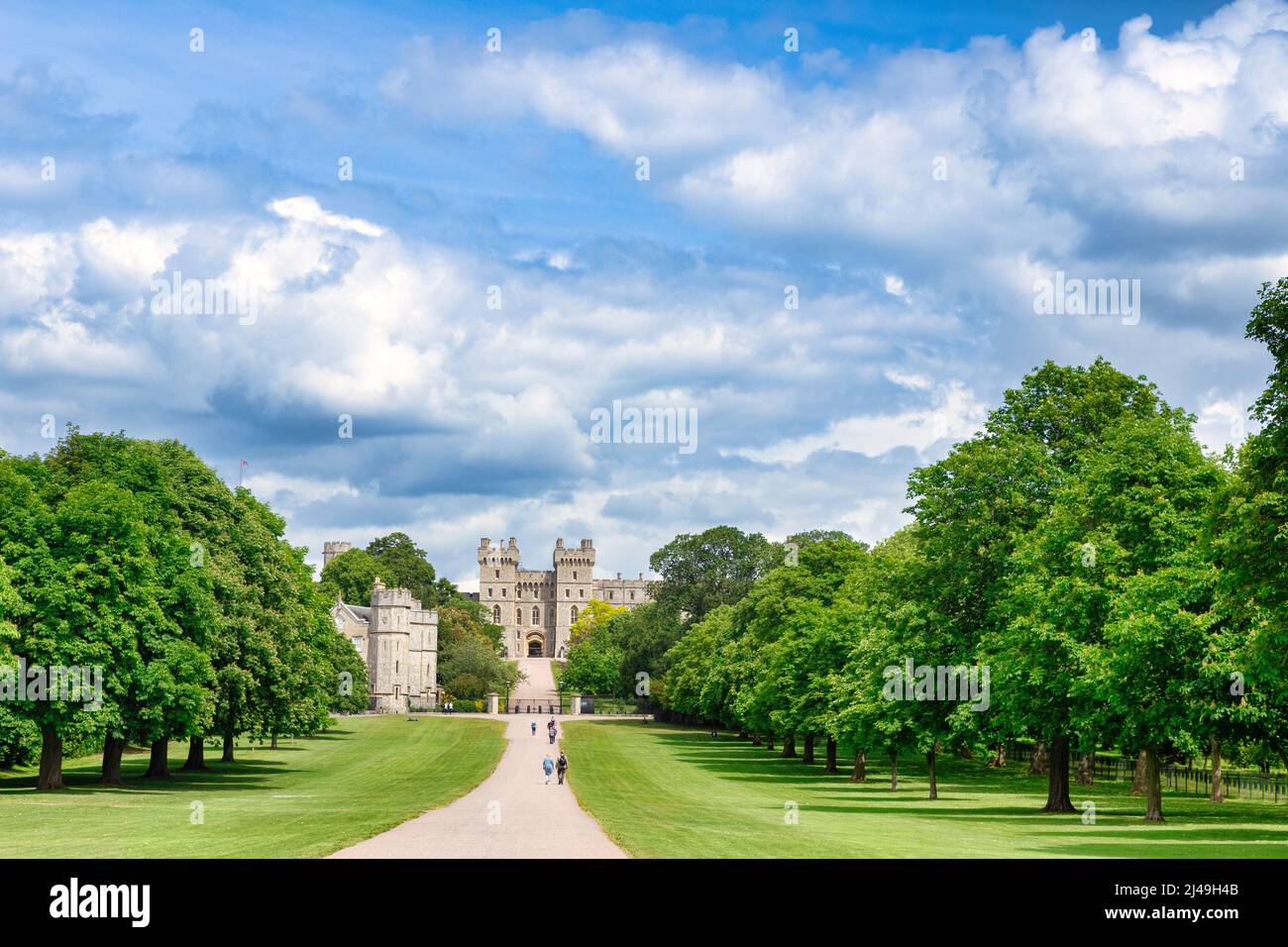 5 June 2019: Windsor, Berkshire, UK - Windsor Castle, home of the British monarch, and the Long Walk, with its avenue of trees in full leaf, people wa Stock Photo