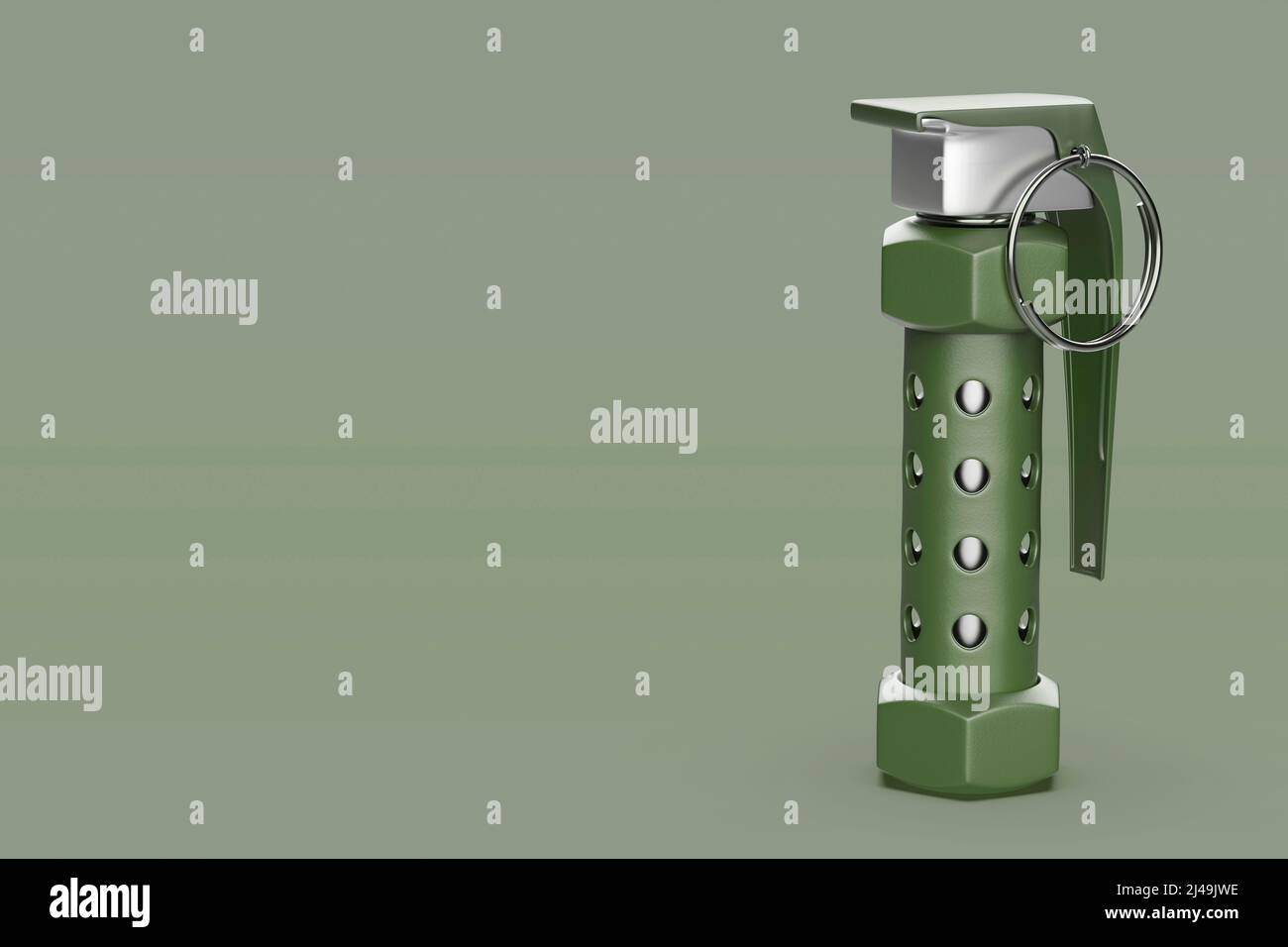 Stun grenade on green background Stock Photo