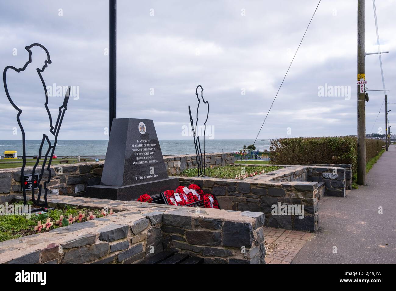 War Memorial at the seafront in the Co. Down coastal town of Millisle, Northern Ireland. Stock Photo