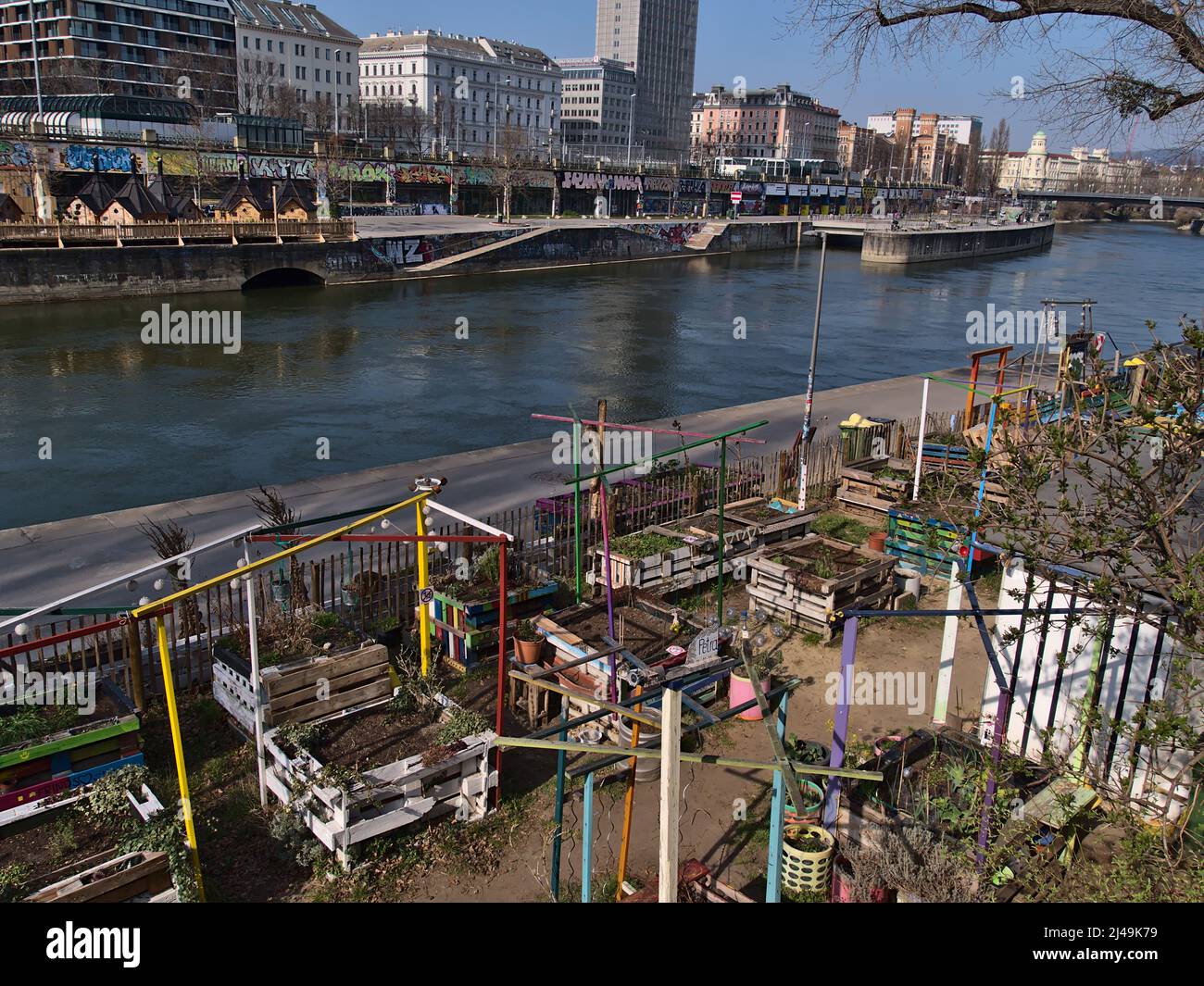 View of a community garden at the bank of river Donaukanal in the historic center of Vienna, Austria on sunny day in spring. Stock Photo