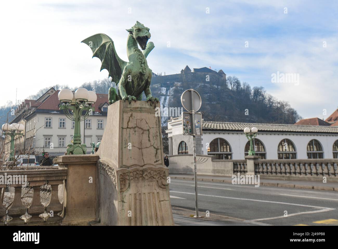 Ljubljana: Dragon Bridge, with the Castle on the background. Slovenia Stock Photo