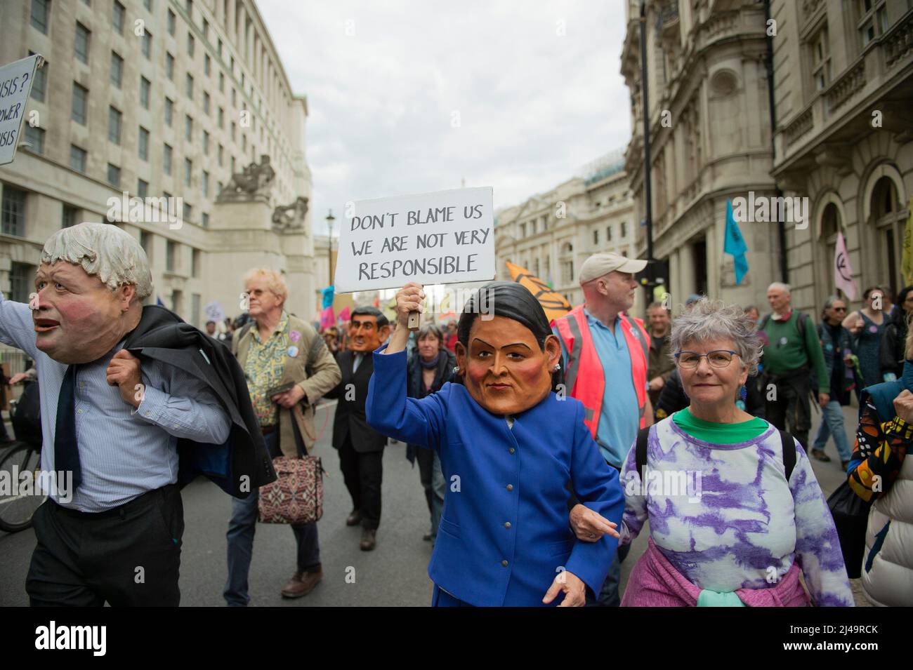 London, UK. 13th Apr, 2022. Climate change demonstraters take part in a march from Hyde Park to Westminster Bridge demanding the government take immediate action to end the UK's reliance on fossil fuels. Credit: claire doherty/Alamy Live News Stock Photo