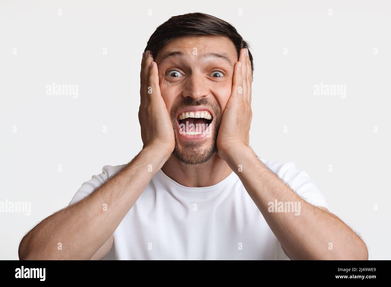 Excited face, man hi-res stock photography and images - Alamy