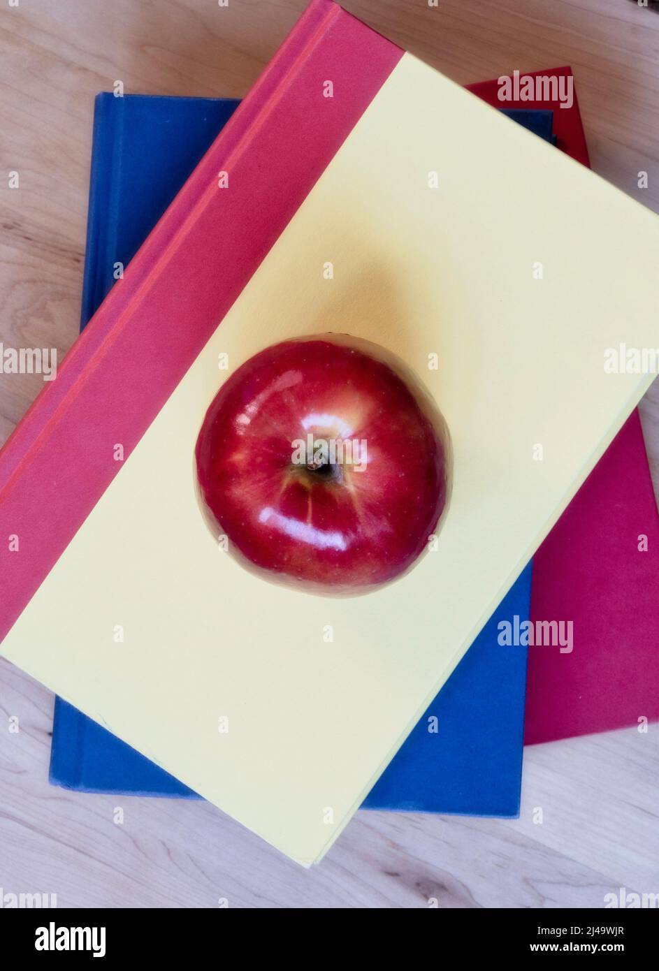 Giving an apple the teacher is a symbol of appreciation in the United States Stock Photo