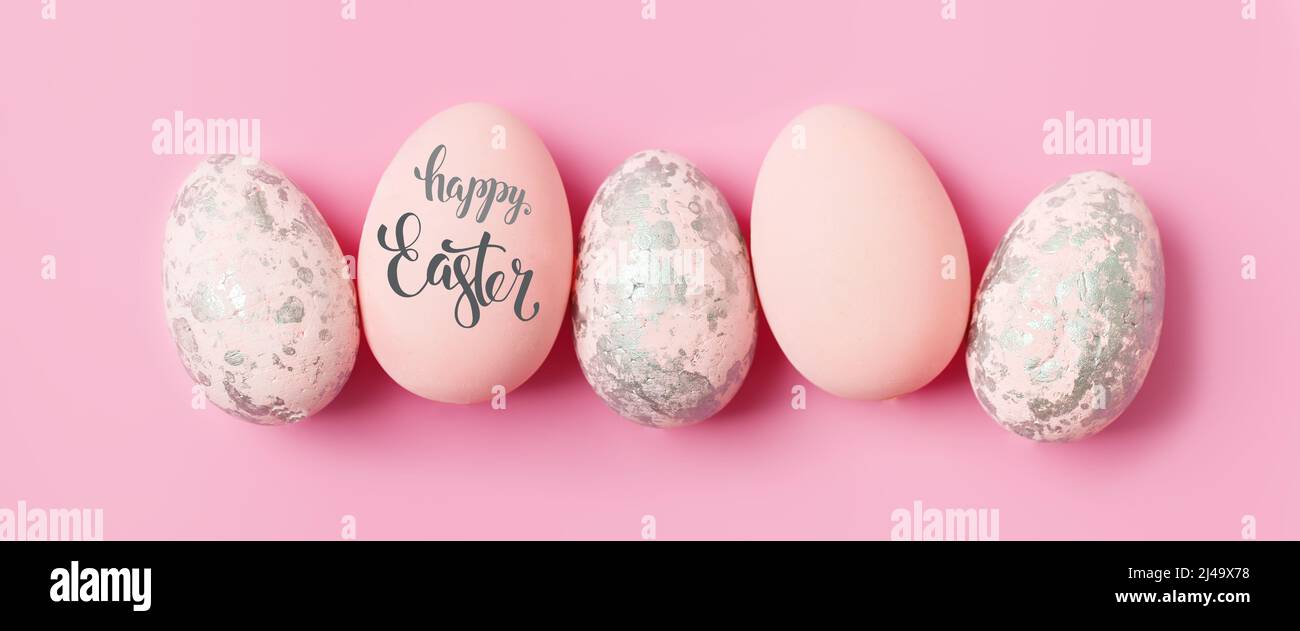 Happy Easter. Congratulatory easter background. Selective focus. Banner. Flat lay. Horizontal. Stock Photo