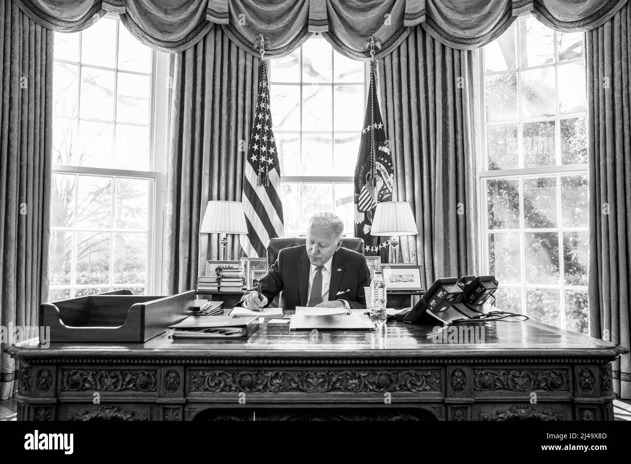 President Joe Biden participates in a secure call with transatlantic leaders regarding Russia’s invasion of Ukraine, Monday, February 28, 2022, in the Oval Office. (Official White House Photo by Adam Schultz) Stock Photo