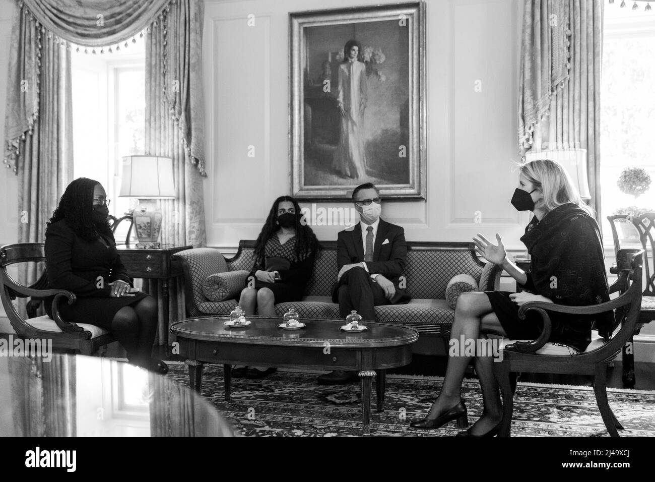 White House Counsel Dana Remus talks with Judge Ketanji Brown Jackson and her family, Friday, February 25, 2022, in the Vermeil Room. (Official White House Photo by Cameron Smith) Stock Photo