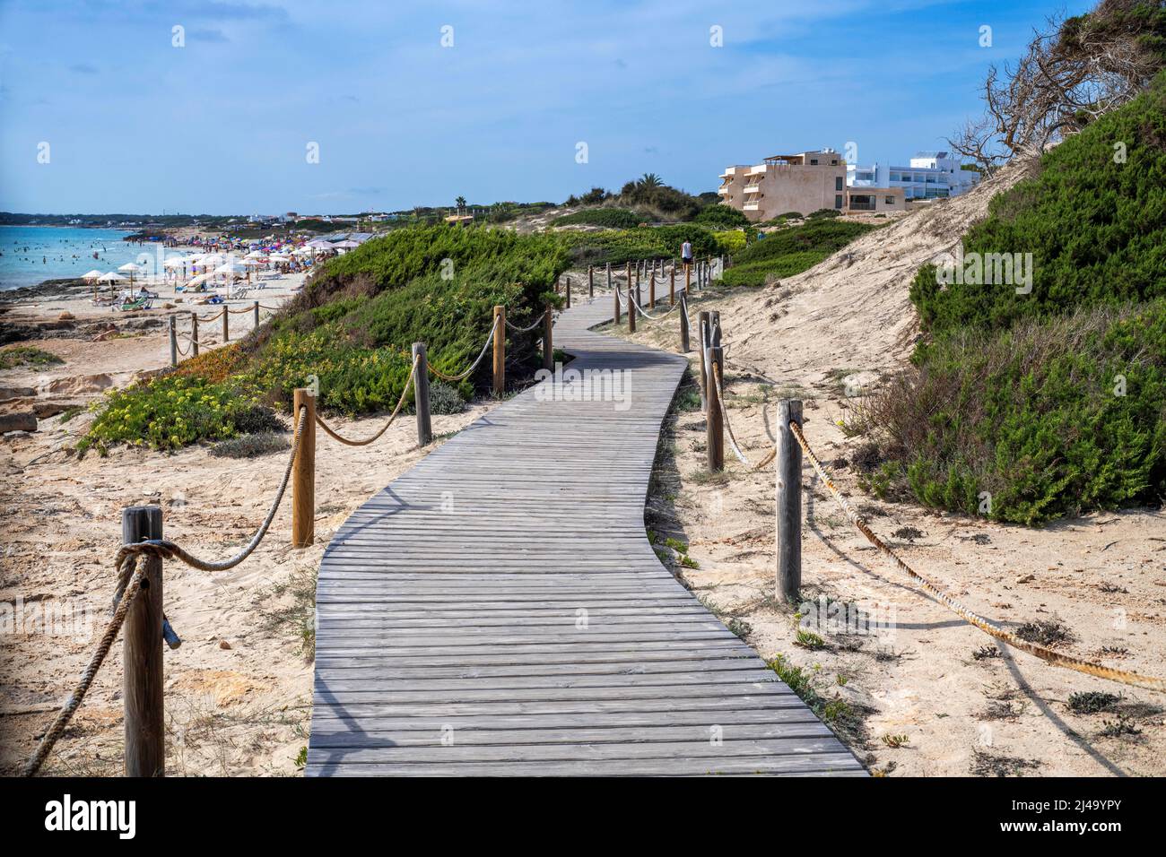 Wooden walkway next to Platja Mitjorn beach, Formentera, Balearic islands, Spain. Stock Photo