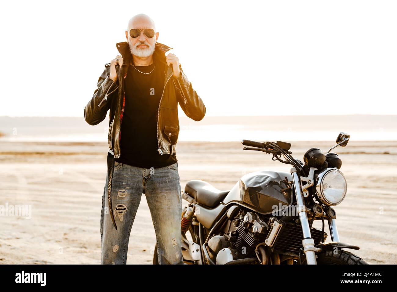 Senior man in leather jacket hi-res stock photography and images - Alamy
