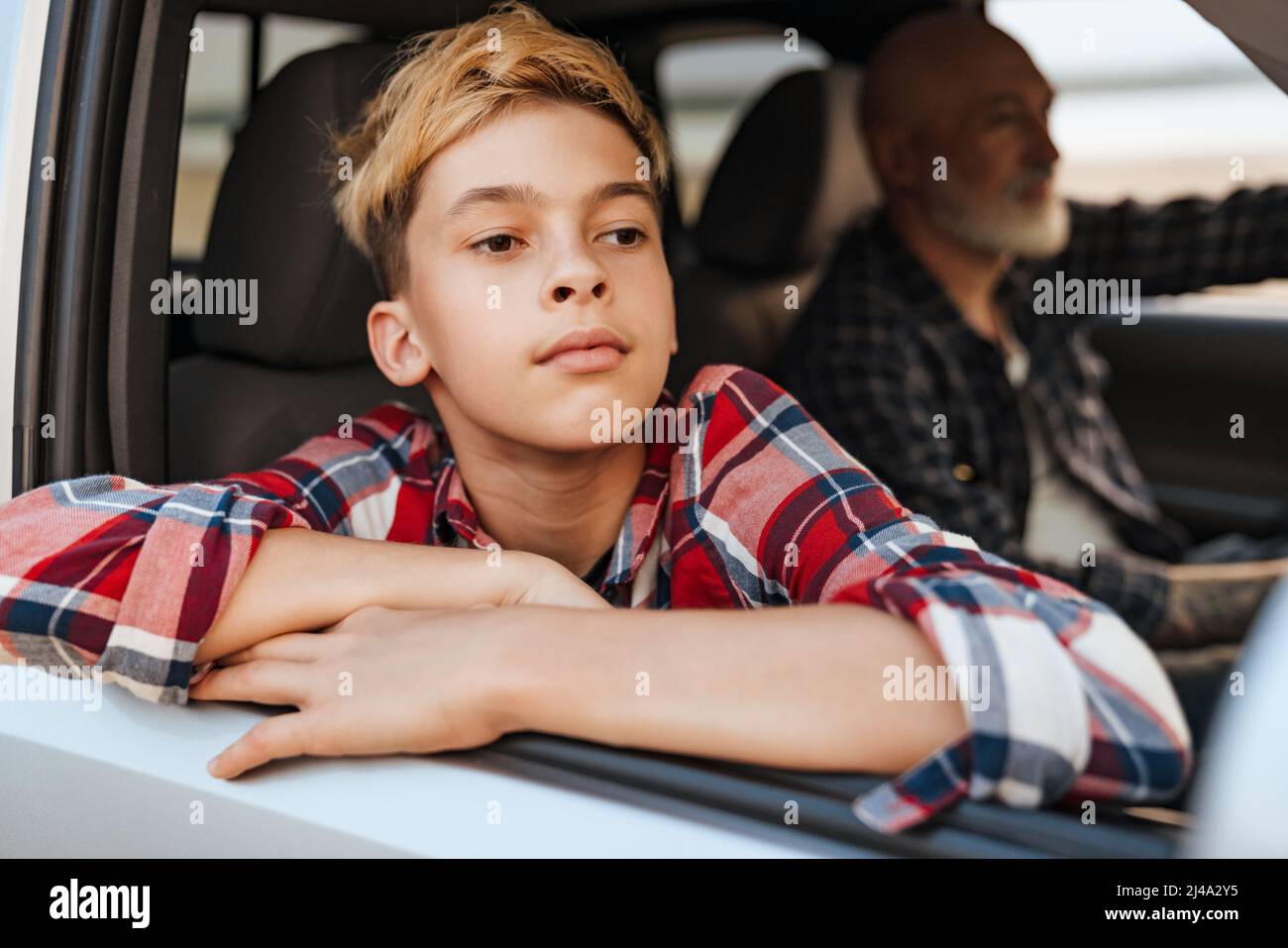 Father teen son in car hi-res stock photography and images - Alamy