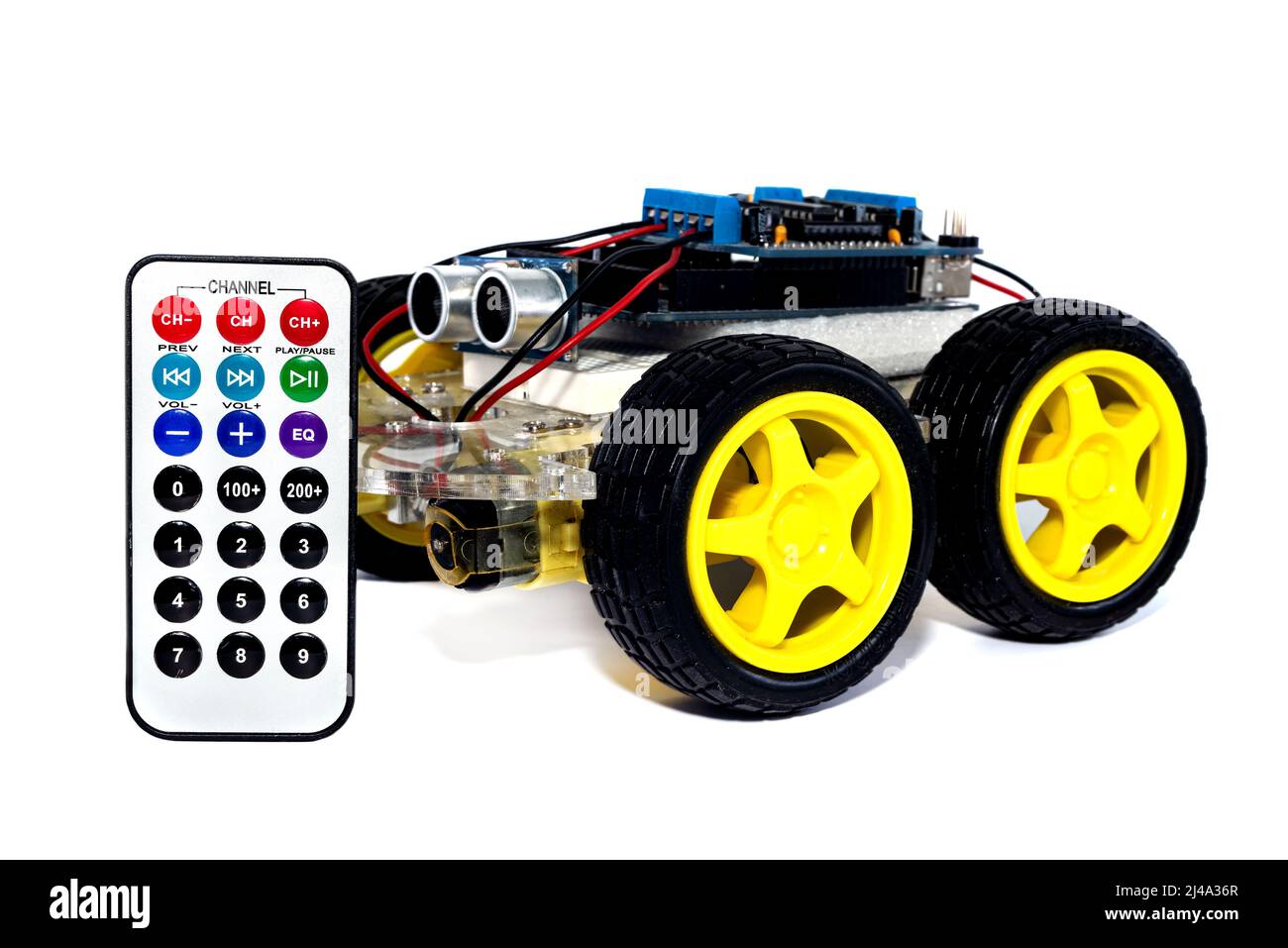 Children's robotics.Programmable robotic car with obstacle avoidance and line following ability, isolated on white background with clipping path. Car Stock Photo