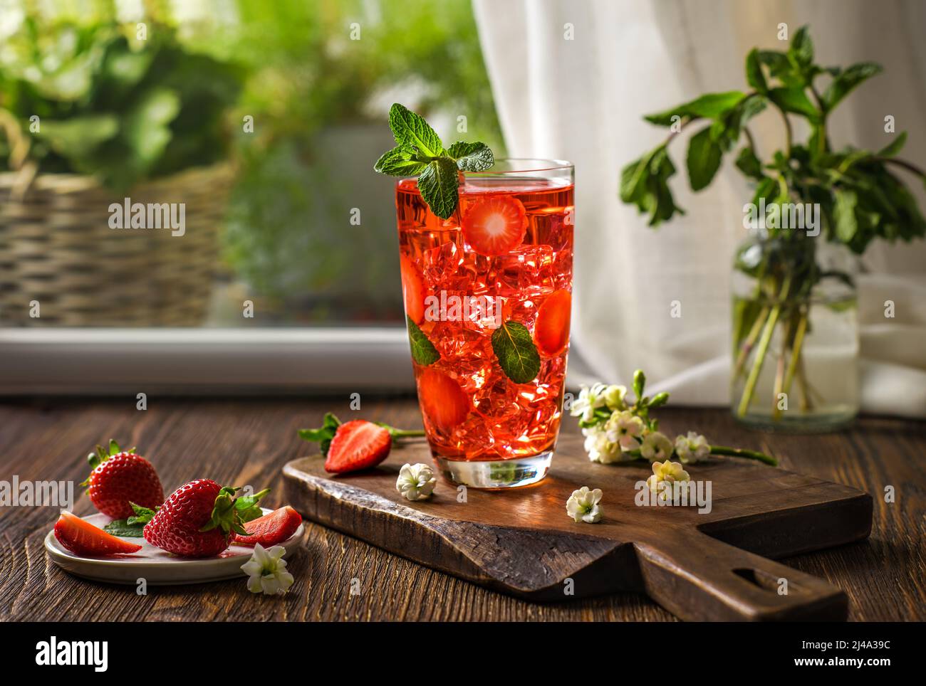 Strawberry lemonade with mint. Iced tea with strawberries. Summer