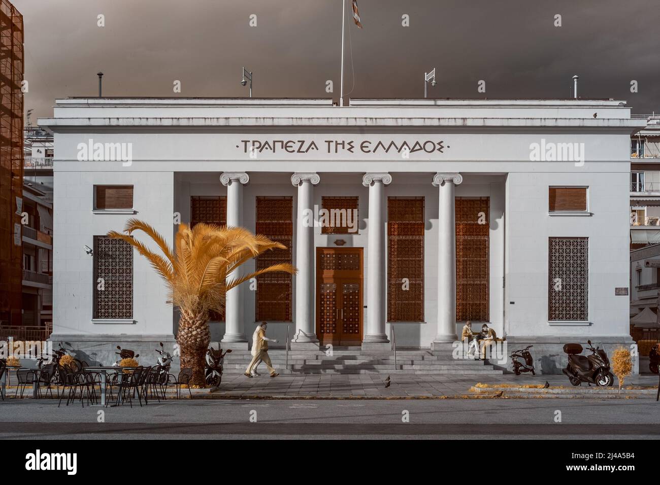 Infrared surreal architecture scene of the building of the  Bank of Greece in the city of Volos , Greece Stock Photo