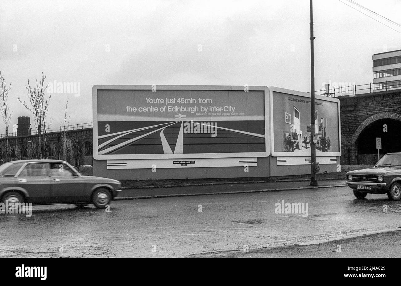 Archive photograph of British Rail inter-city railway poster in Glasgow, advertising that you could be in Edinburgh in 45 minutes.  Image is scan of original b&w negative taken in March 1977. Stock Photo