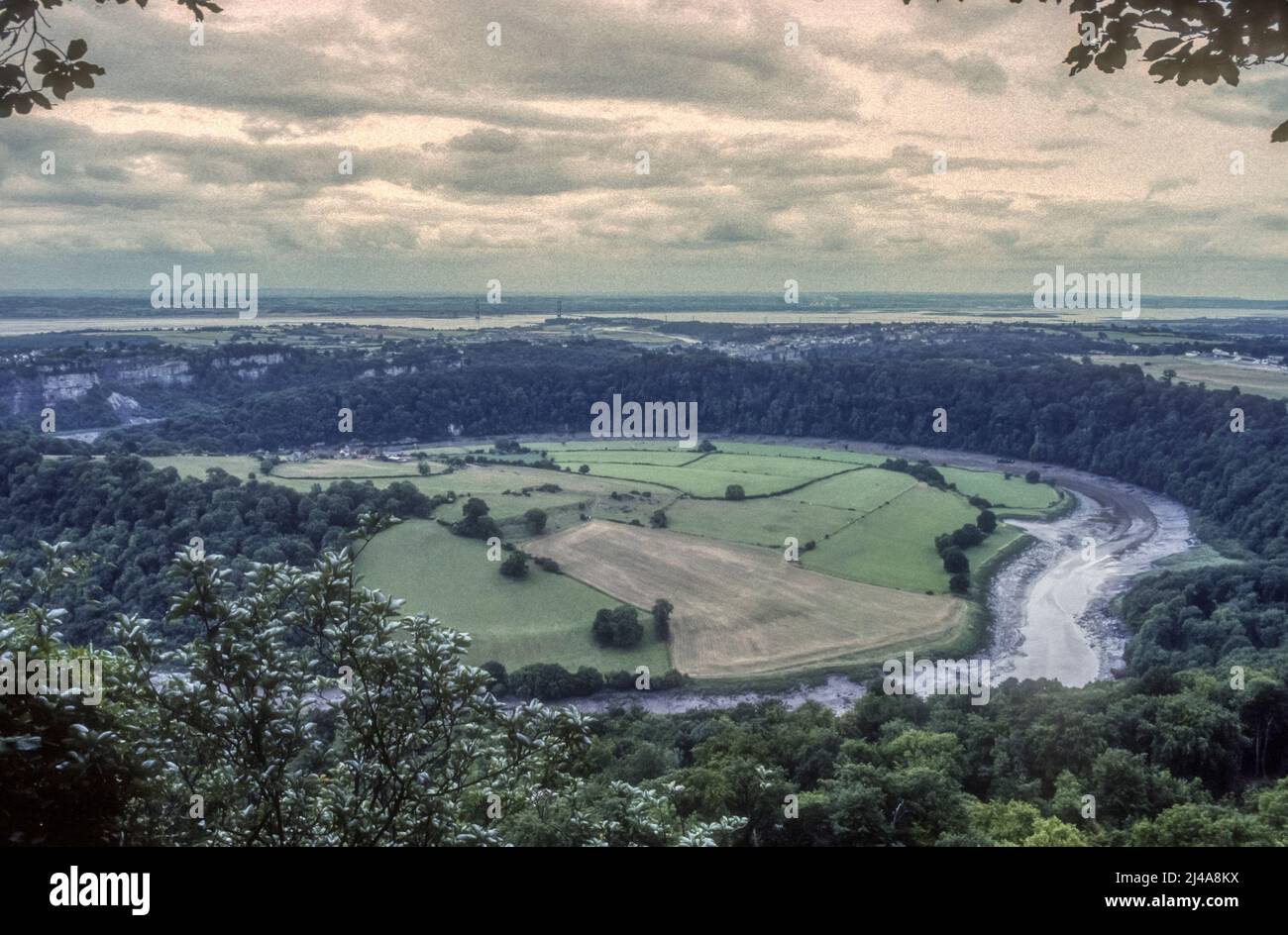 View of Chepstow from the Wye Valley long distance footpath, across a meander in the River Wye forming the border between England and Wales. Stock Photo